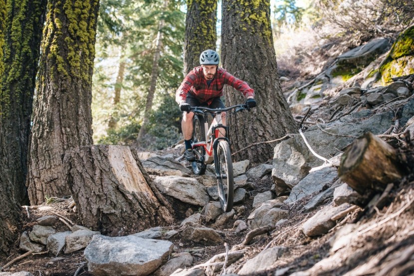 enduro mountain bike - hang on tight through the chunk.