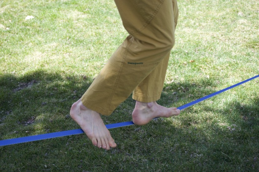 slackline - one-inch webbing looks thin underfoot, but with adequate tension...
