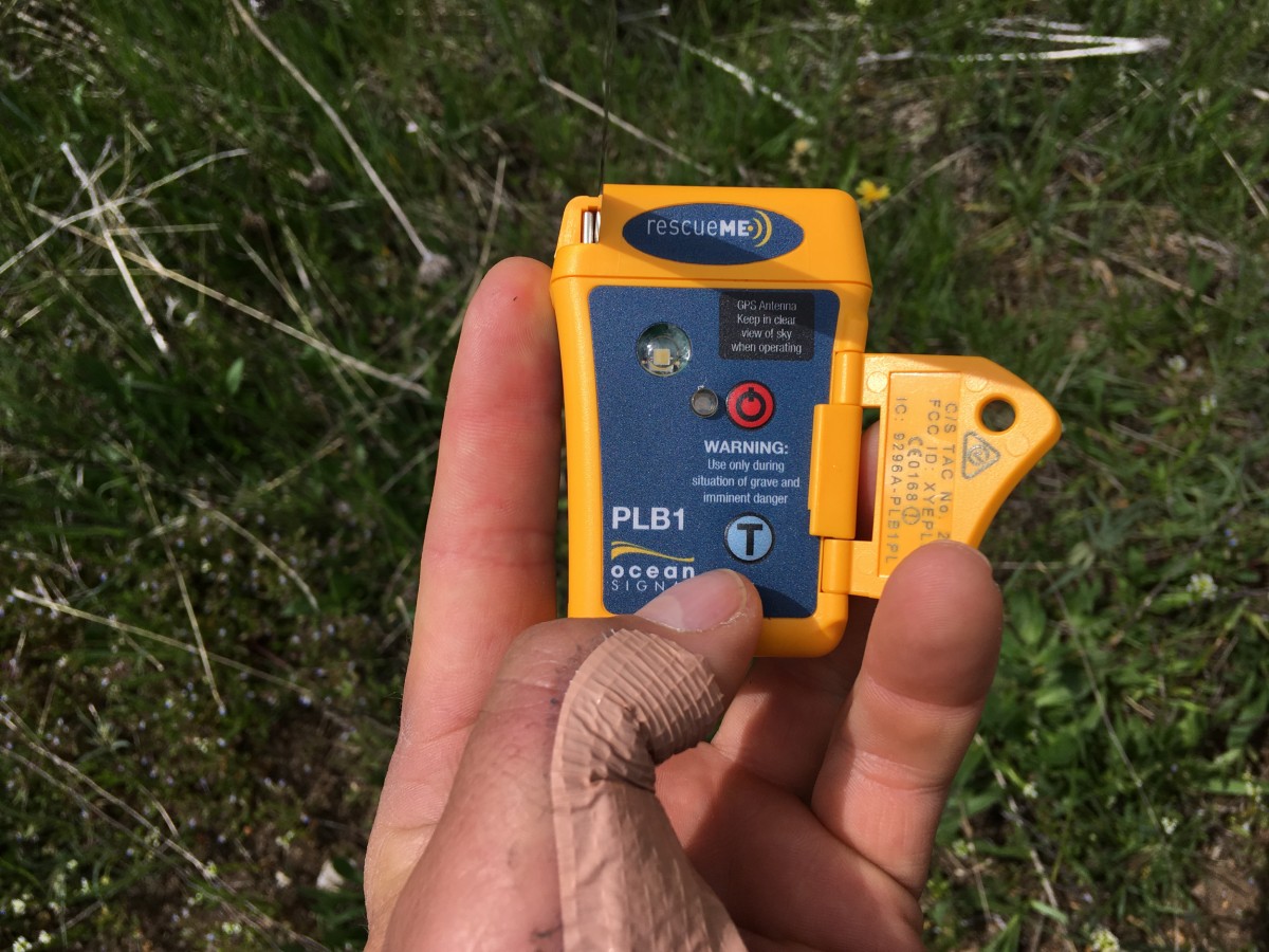 Ocean Signal rescueME PLB1 Review (There is a spring-loaded cover that helps to prevent accidental activation of the PLB1. Here it is shown open.)