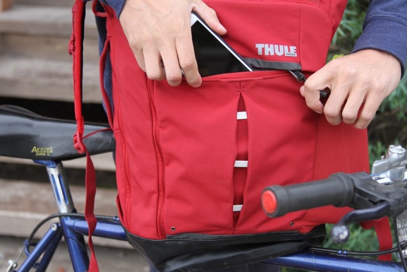 the quick-access pocket provides storage for items like a cell phone...