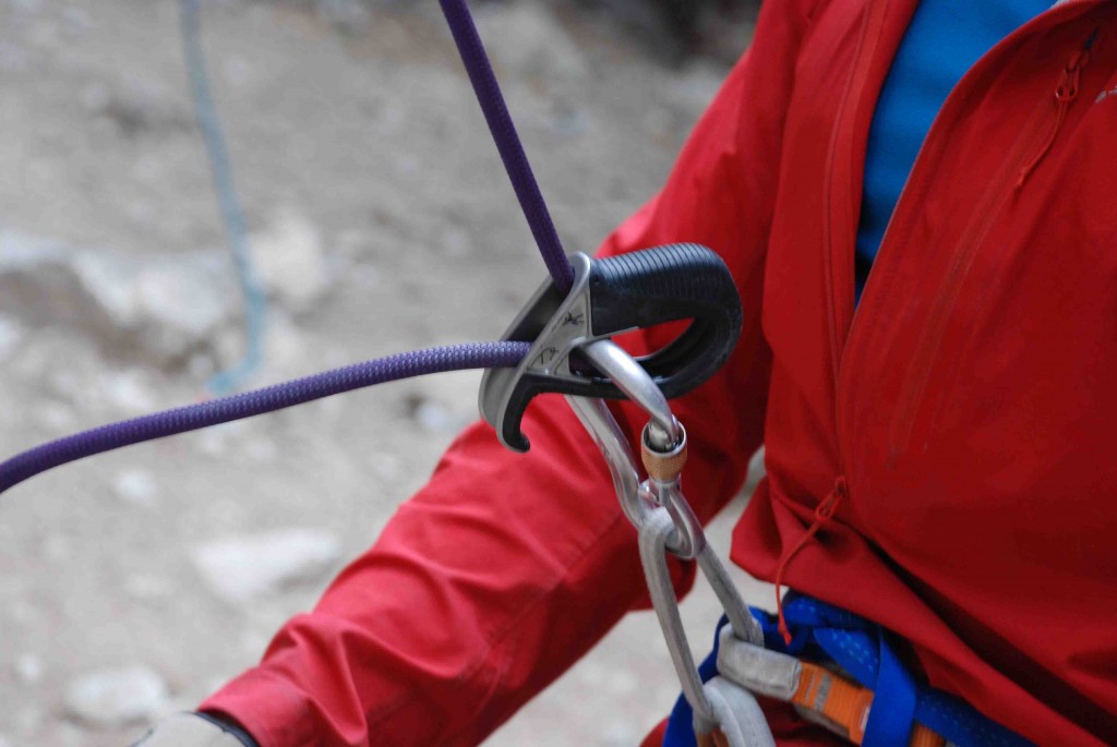 belay device - a passive device has no moving parts other than the device itself...