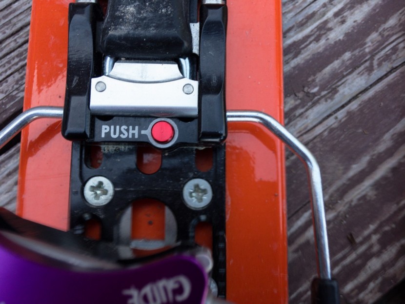 plum guide xs stopper - the red button prevents the silver bar from sliding. the silver bar...