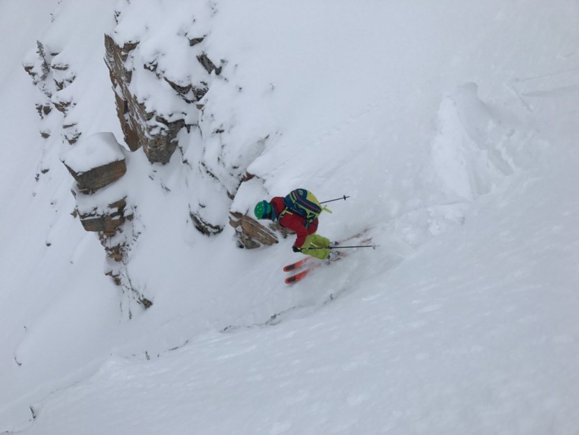 at bindings - steep and high energy skiing, under an expert practitioner, on ski...