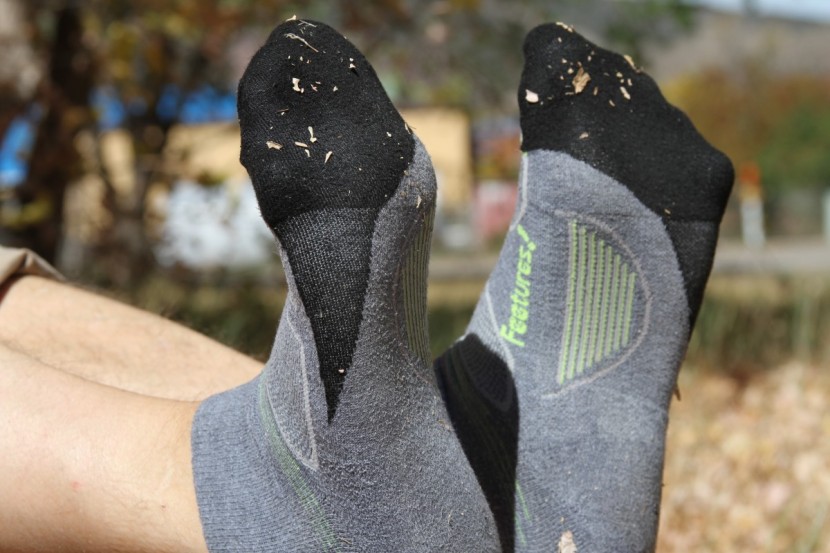 feetures elite max cushion quarter - compression panels and stretchy fabrics make these socks comfortable...