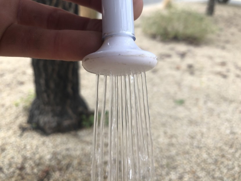 coghlan&#039;s 5-gallon - a narrow shower head limits the coverage of this shower.