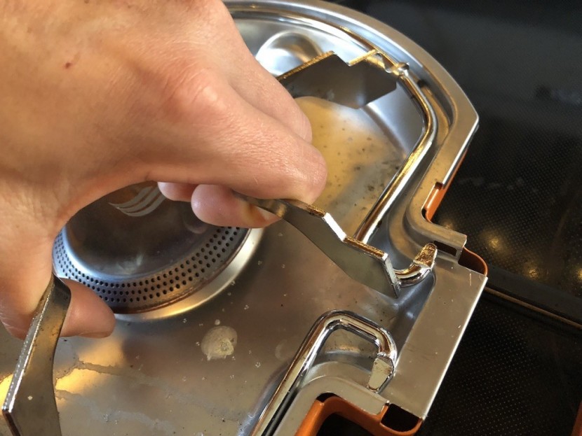 jetboil genesis basecamp - just squeeze the side of the cooking grate to remove it from the...