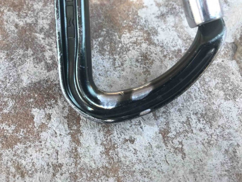 carabiner - the anodized layer will wear off in the basket where the rope runs...