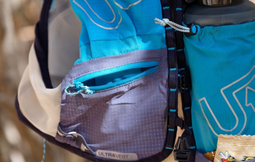 ultimate direction ultra vest 4.0 - there are pockets and storage nearly everywhere on this vest. the...