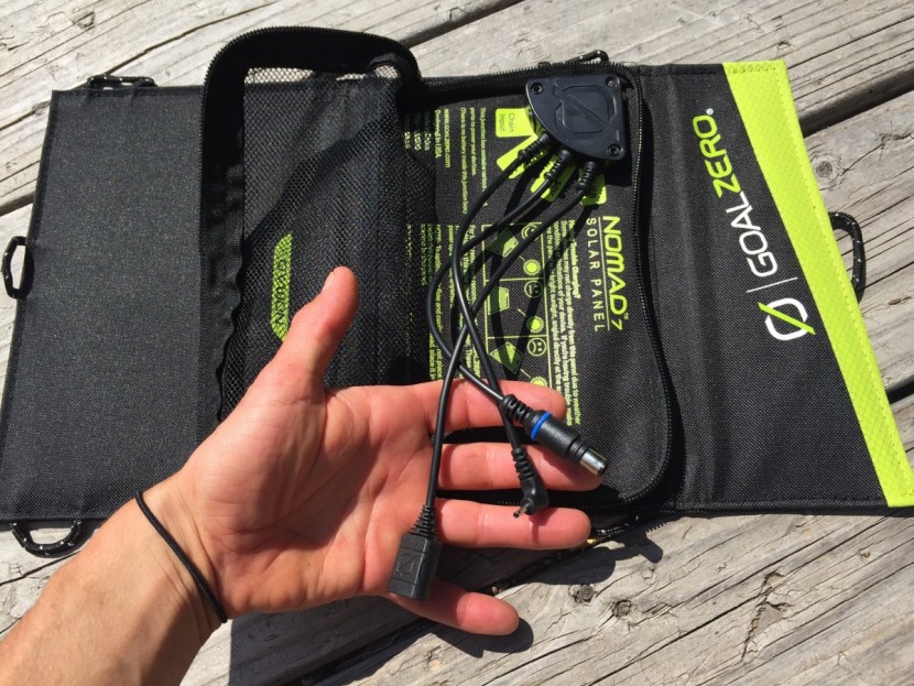 goal zero nomad 7 - the array of cords that come with the goal zero panel are shown...