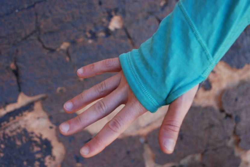 patagonia r1 hoody for women - the arms are on the long side so that the thumb loops fit.