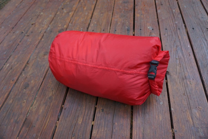 outdoor research ultralight dry sack - this large cylinder easily fits multiple changes of clothes.