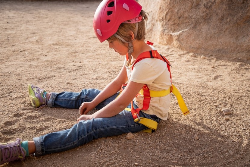 camp bambino full-body - waiting for her turn to climb.