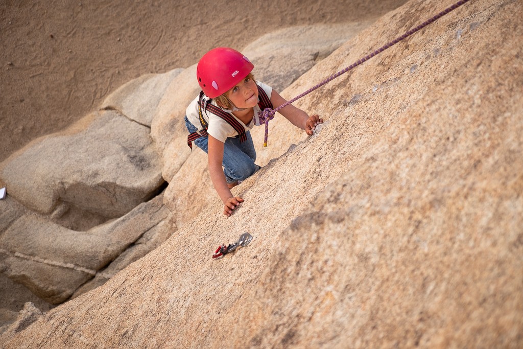 trango junior - a tester using the trango junior ascends a row of protrusions.
