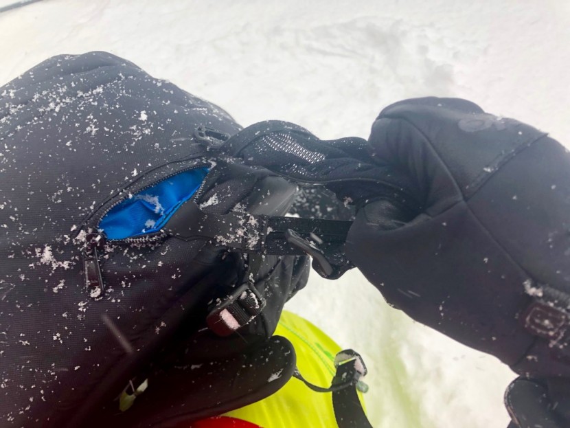 black diamond jetforce tour 26l - pulling the helmet holder/sling out of its small zippered stash...
