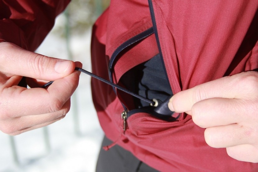 patagonia micro puff storm for women - the hem-line pull tabs are located in the pocket. these tighten a...