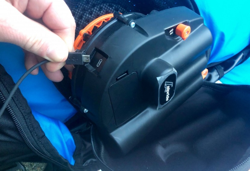 the alpride system's battery plugs in via a micro usb. when plugged...