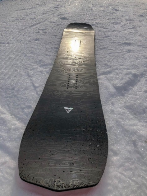 arbor bryan iguchi pro camber - the intricate graphic artwork by bryan iguchi, accentuated by the...