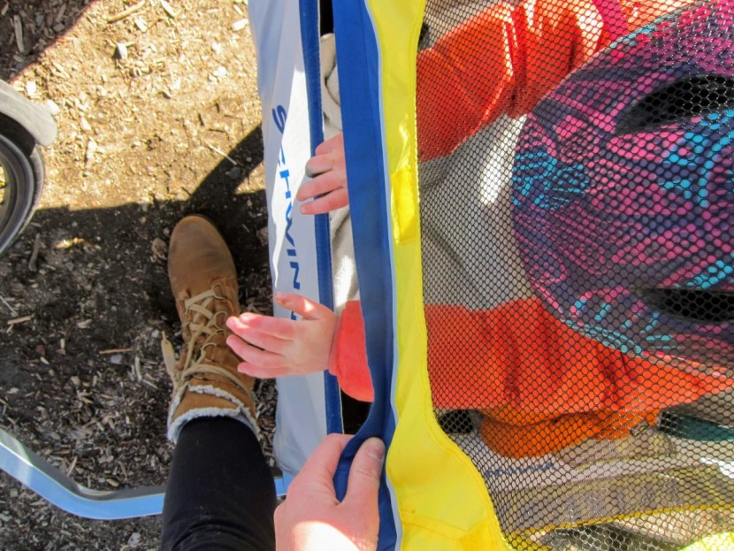 bike trailer - since it&#039;s only secured by velcro, a squirmy passenger can easily...