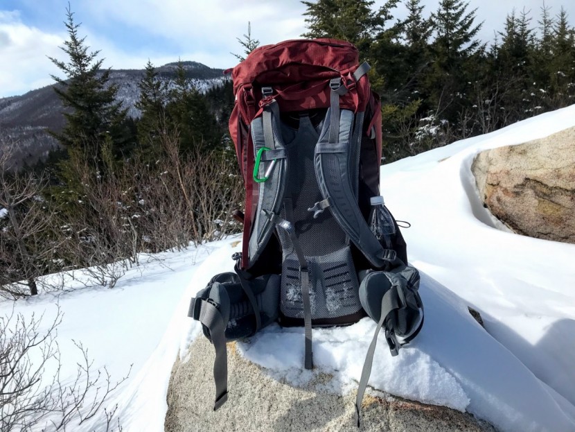 rei co-op traverse 70 - this pack has a beefy waist belt and moderately ergonomic shoulder...