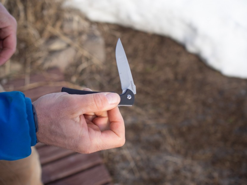 kershaw chill - the chill flicks open with the index finger of the same hand holding...