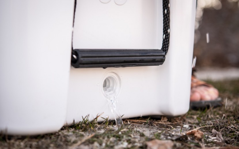 yeti tundra 65 - thick, easy grip handles help you cart around this ice chest with...