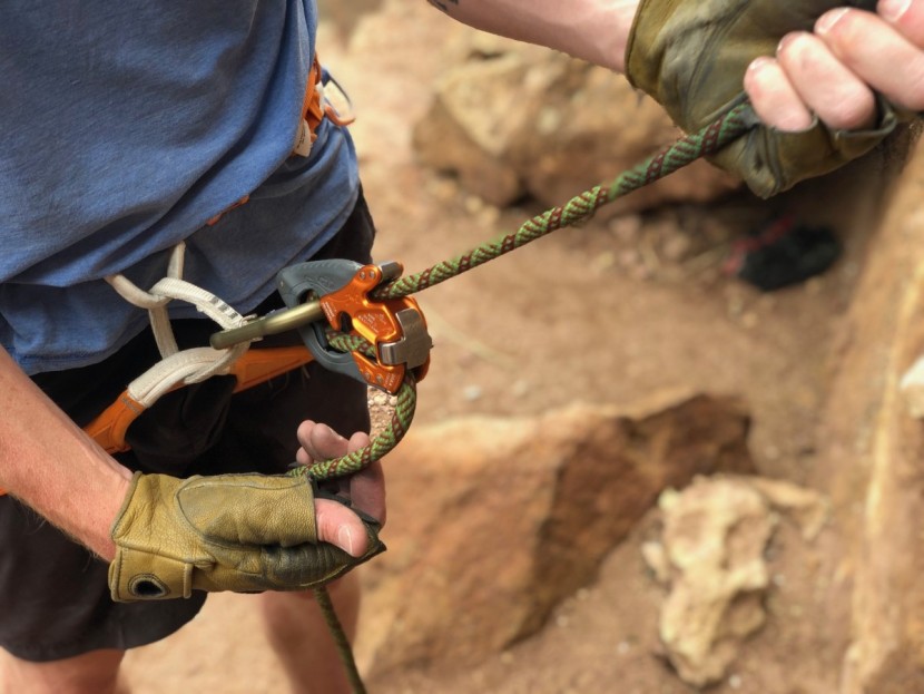 climbing technology clickup +. - when belaying a leader, the carabiner and rope will be held by the...