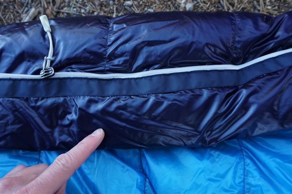backpacking sleeping bag - the marmot phase 20 has a noticeably big draft tube to prevent heat...