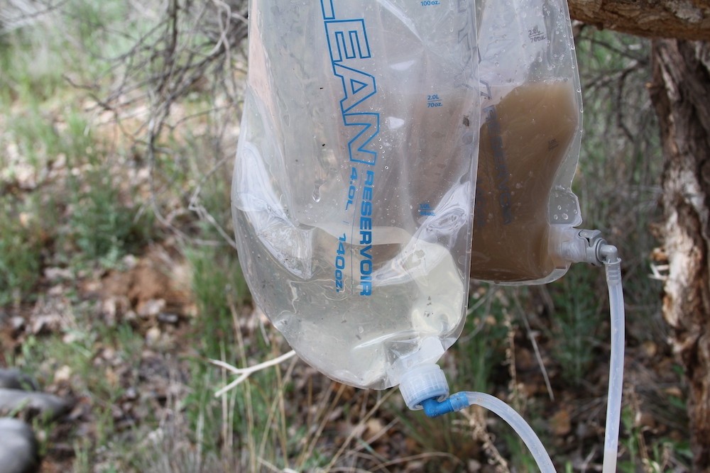 backpacking water filter - the platypus gravityworks hard at work, cleaning out super turbid...