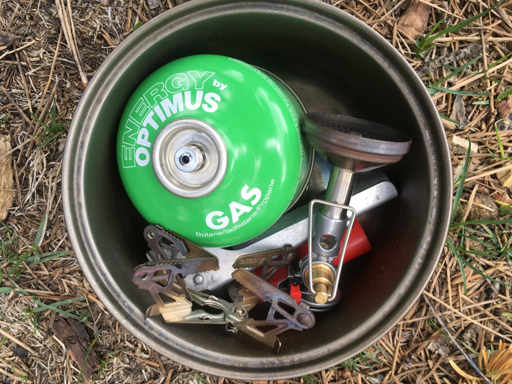 backpacking stove - a 4-ounce fuel can, lighter, pot grip, windmaster burner, and pot...