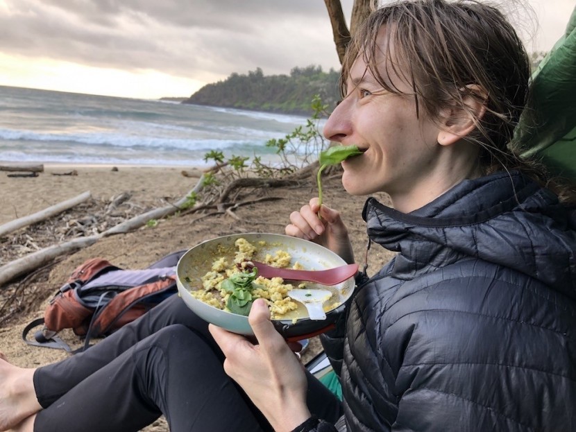 camping cookware - grungy but happy, enjoying a meal on the beach.