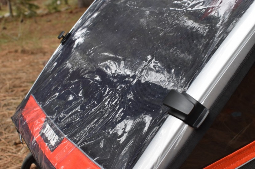 thule chariot cross 2 - the six clips can be attached anywhere along the sides of the rain...