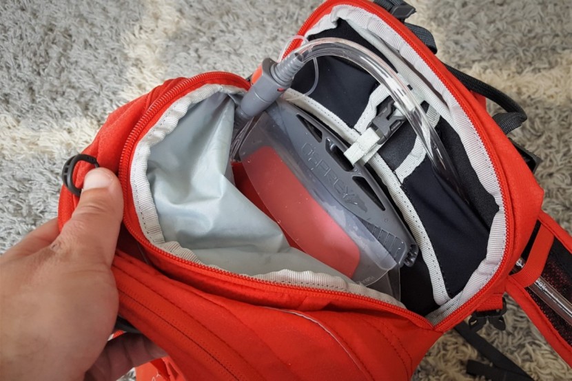 hydration pack - the easily accessible bladder sleeve and quick release tubing on the...