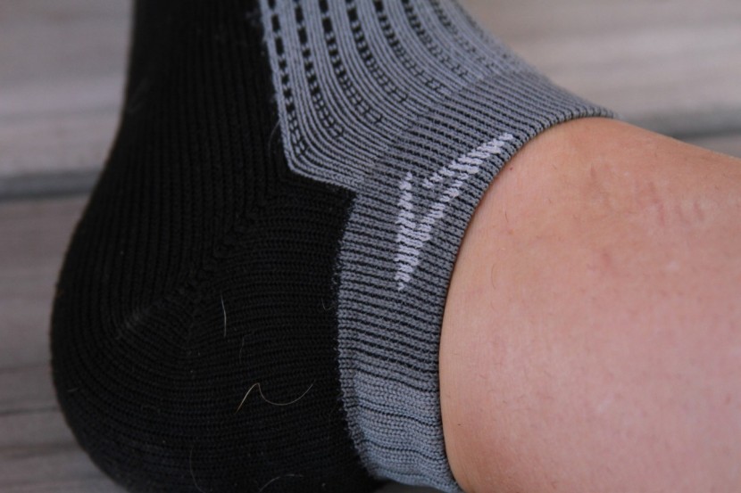 drymax running mini crew - the material is thicker and does a decent job at preventing slippage...