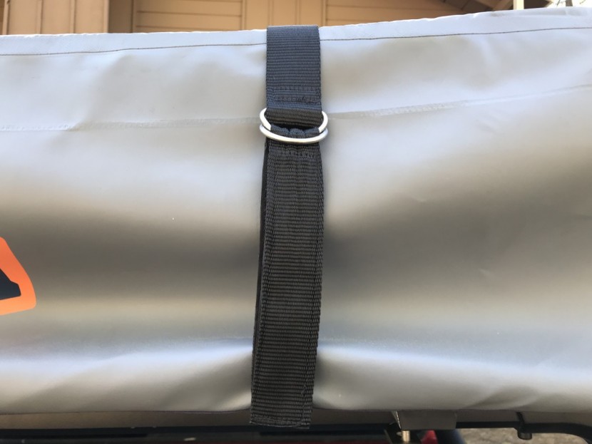 rooftop tent - the tepui model cover straps are secured with large metal d-rings...