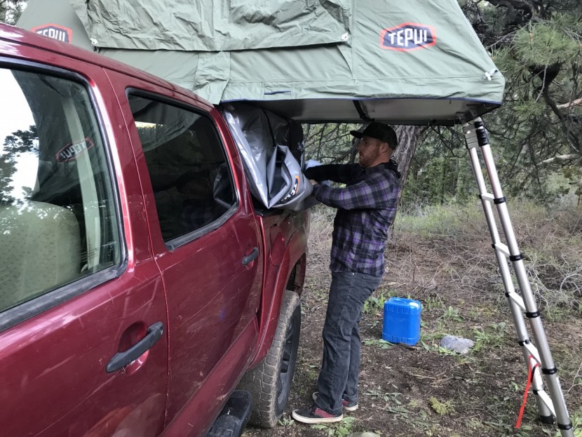 rooftop tent - the travel covers on the the tepui and yakima models have straps...