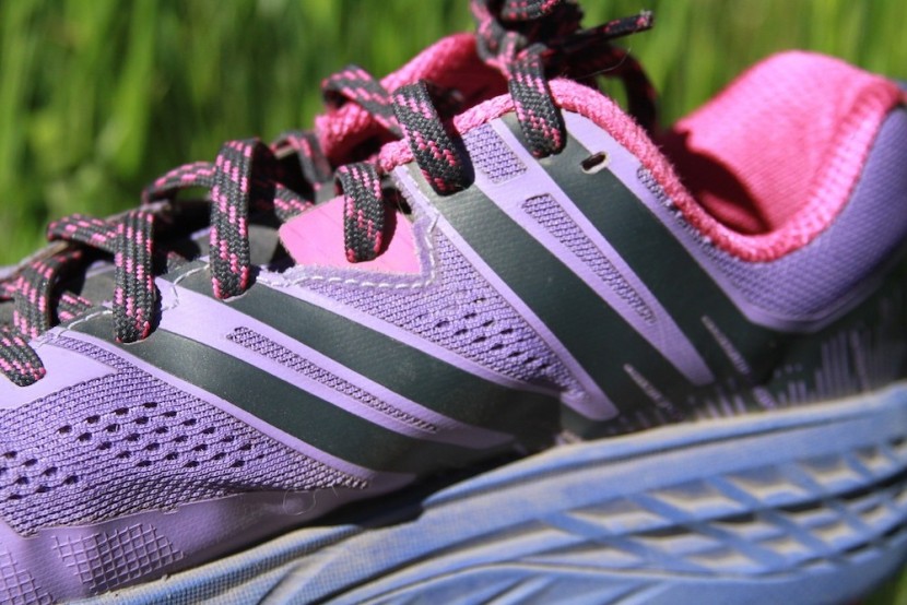 hoka speedgoat 3 for women - a look at the harness system that attaches to the lacing system to...