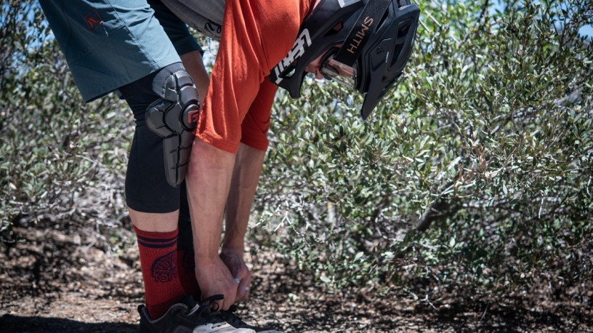 mountain bike knee pads - some pads can be put on and taken off over a pair of shoes. others...