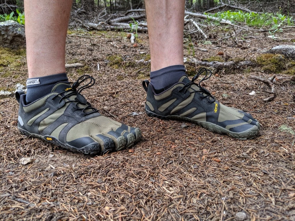 vibram v-trail 2.0 barefoot shoes review - the snug fit of this shoe is braced across the top by a quick-lacing...