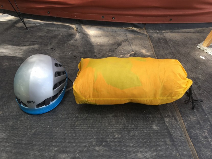 feathered friends khumbu down parka - the khumbu parka packed into its included stuff sack. it can be...