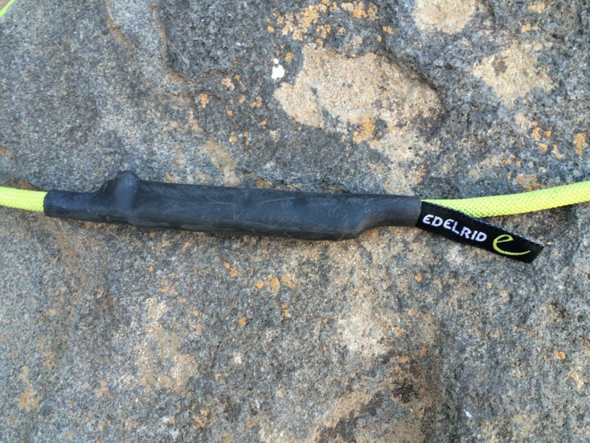 edelrid aramid cord sling - a close up of the thermo-molded rubberized sheath that is covering...