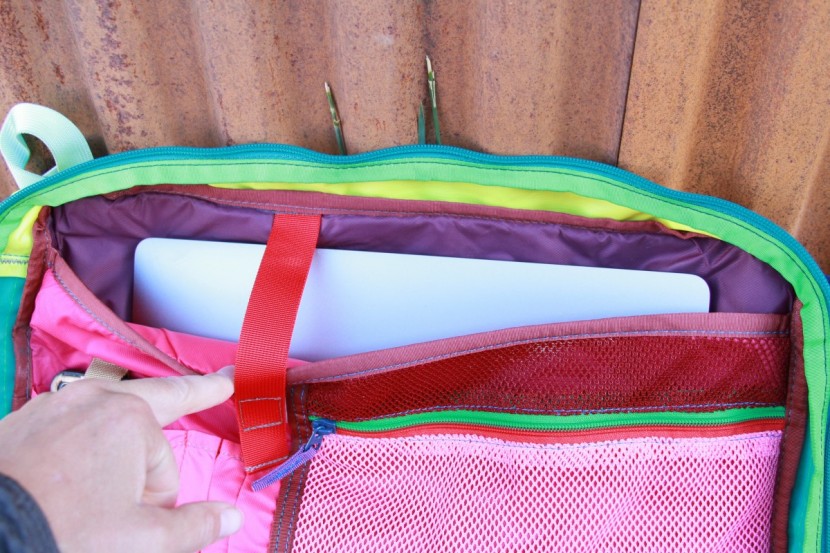 cotopaxi tasra 16l - the laptop sleeve is very large with a security strap that seems a...