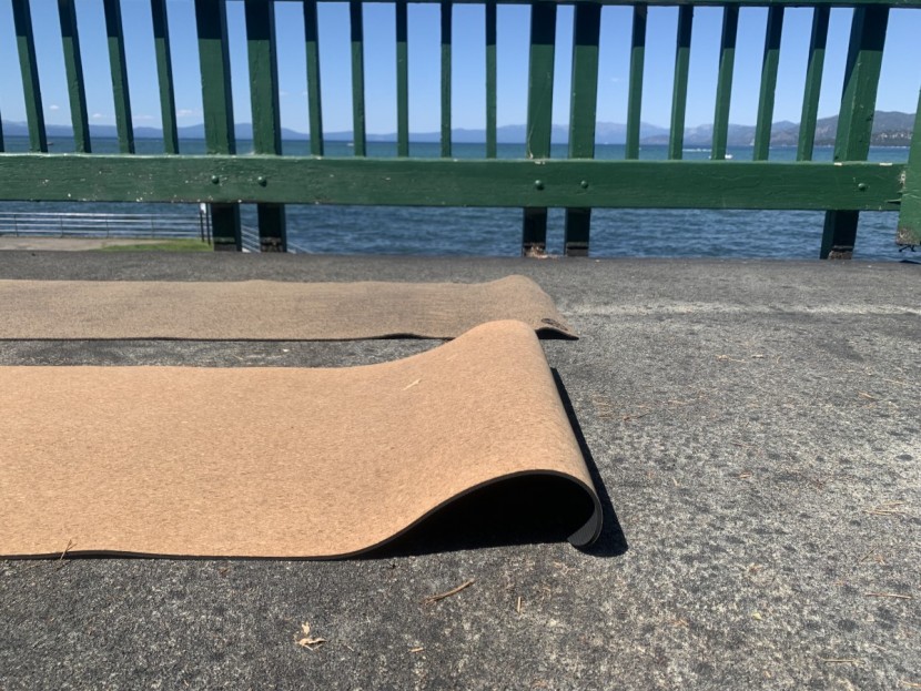 gaiam performance cork - the gaiam rolls up more compared to the yoloha, which rests flatter...