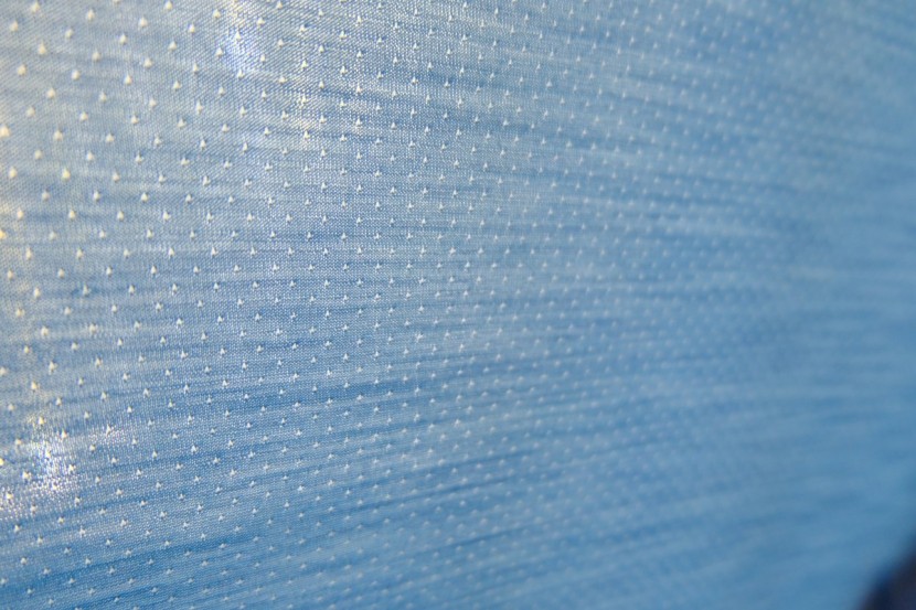 smartwool merino sport 150 tech - the entire back panel is made from a merino/polyester mesh making it...