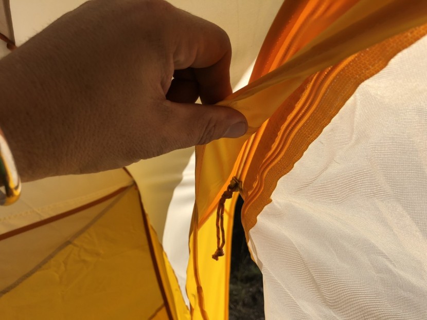 big agnes big house deluxe 6 - oddly, the flap covering the door zippers is on the inside of the...