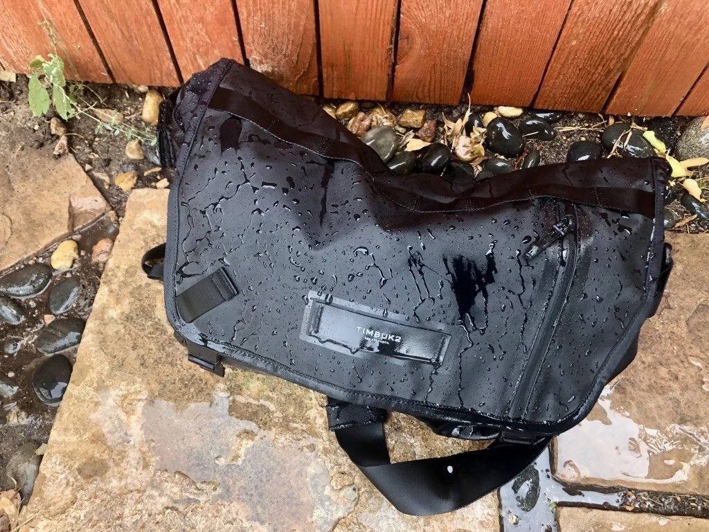 messenger bag - water just slides off the impervious stash. no matter what...