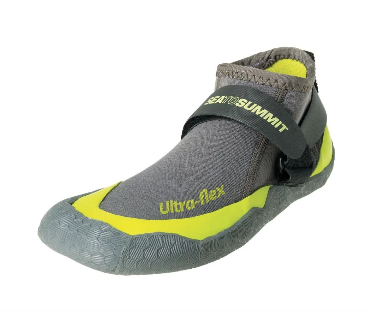 Sea to Summit Ultra Flex Booties on rocky shoreline during water sports activity