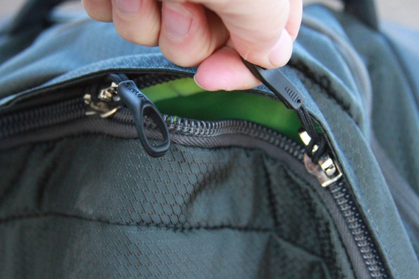 osprey sojourn 80l - a look at the burly and durable zippers with oversized pulls.