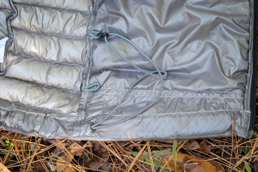 the north face summit l3 hoody - the hem cord can be clipped up to the inside of the jacket to keep...