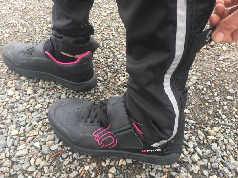 showers pass transit for women - cinching the pant legs close as we prepare to hop on our bike. no...