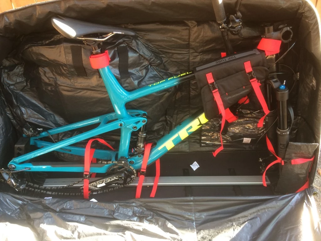 evoc travel bag pro bike travel case review - once the bike is secured to the stand, install it in the case and...